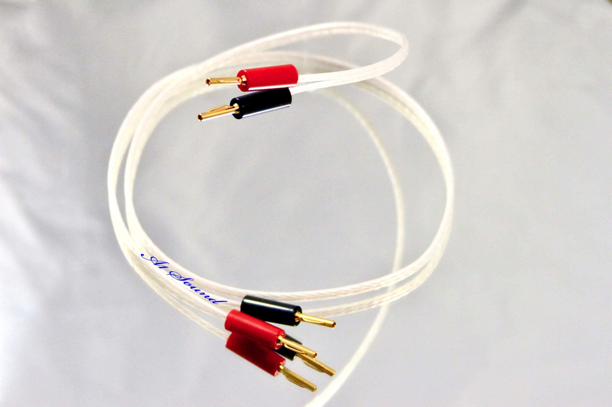QED Performance Silver Micro Speaker Cable 10 Metre Single Length Terminated With Gold Plated Screw type 4mm Banana Plugs On All Ends, 4 Plugs Fitted In Total